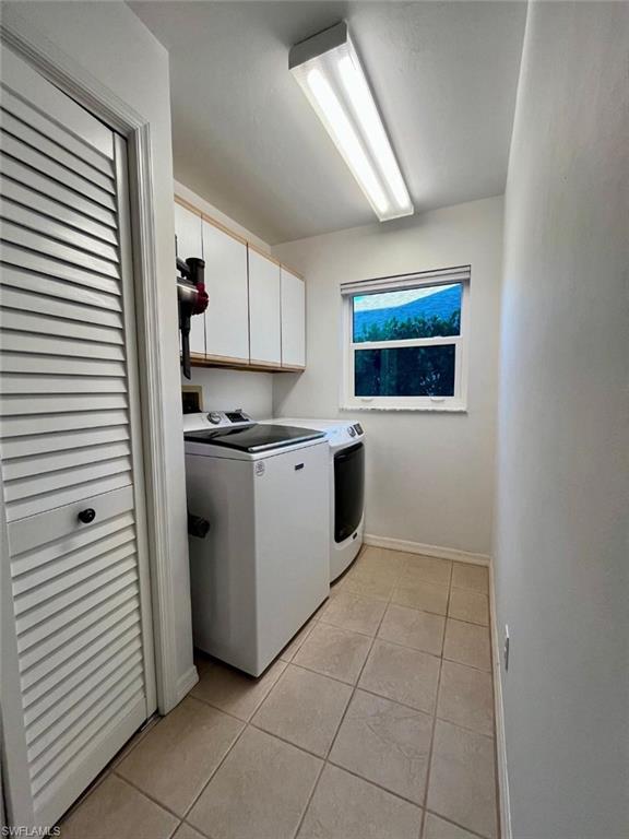 10298 Boca Circle Naples, FL 34109 - Photo 16 of 20 a kitchen with a stove a sink and a refrigerator