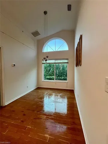 a view of an empty room and window
