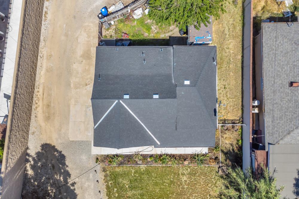 8685 East Stockton Boulevard Elk Grove, CA 95624 - Photo 20 of 29 a house with a trees in front of it