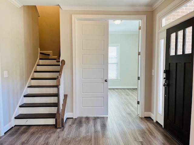 1717 Banks View Drive Raleigh, NC 27603 - Photo 4 of 33 a view of a hallway with wooden floor and entryway