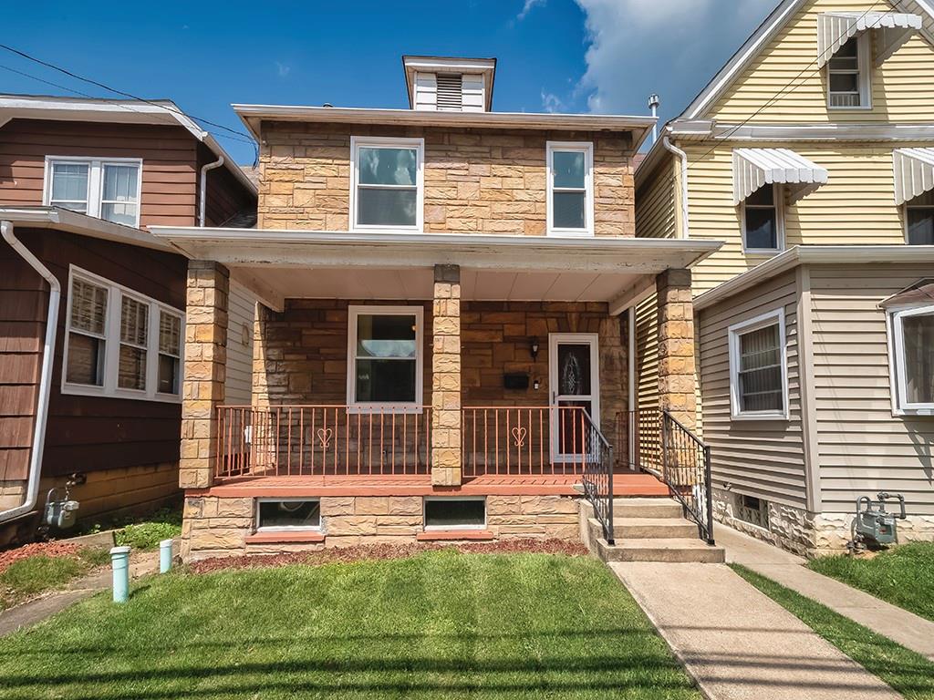 1335 4th Avenue Ford City, PA 16226 - Photo 1 of 27 a view of a house with a patio