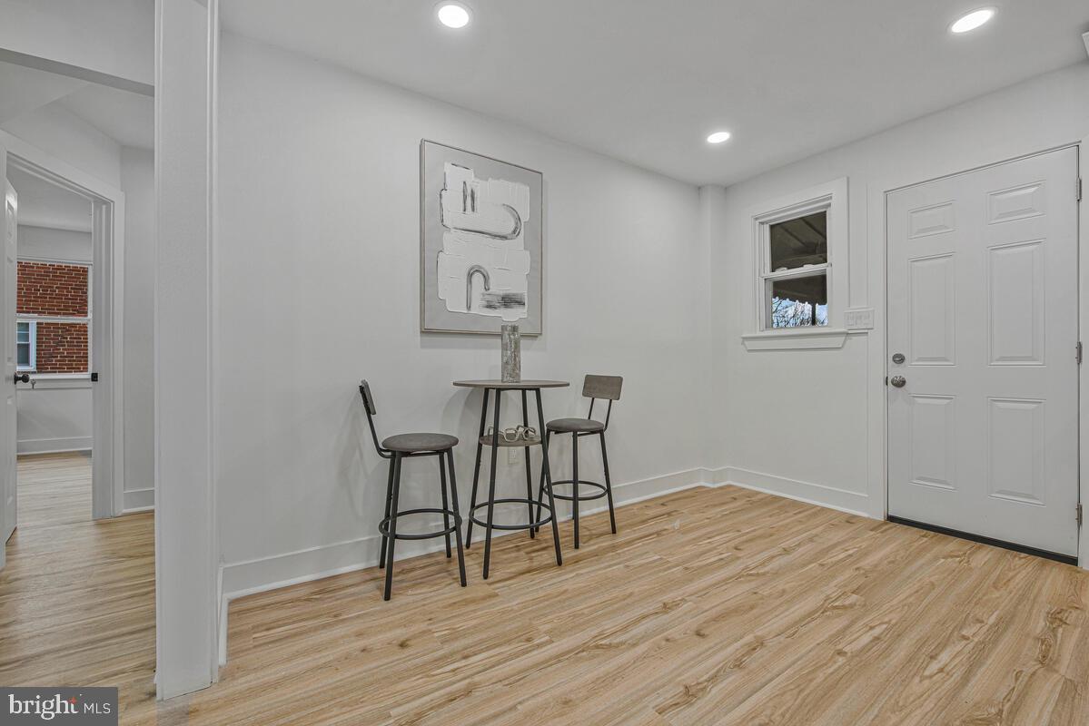 6508 Foster Street District Heights, MD 20747 - Photo 15 of 39 a view of a livingroom with wooden floor and furniture