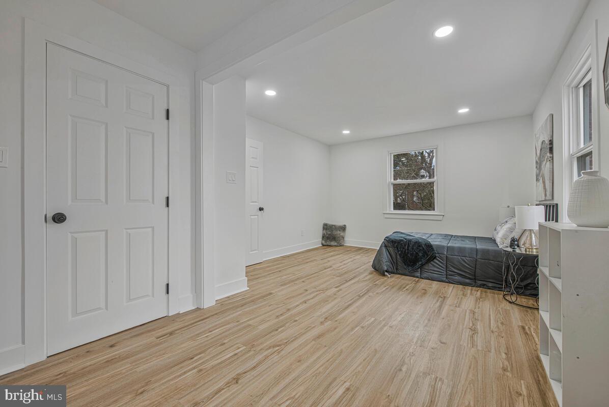 6508 Foster Street District Heights, MD 20747 - Photo 18 of 39 a bedroom with a bed and a couch