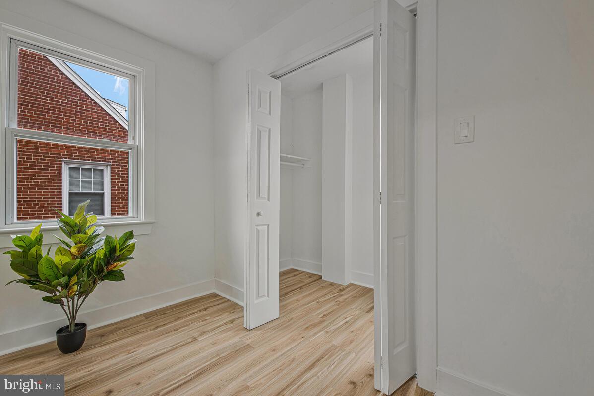 6508 Foster Street District Heights, MD 20747 - Photo 19 of 39 a view of a livingroom with a potted plant