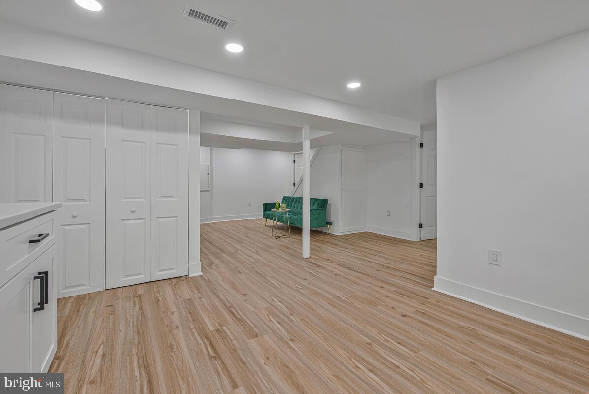 6508 Foster Street District Heights, MD 20747 - Photo 29 of 39 a view of empty room with wooden floor