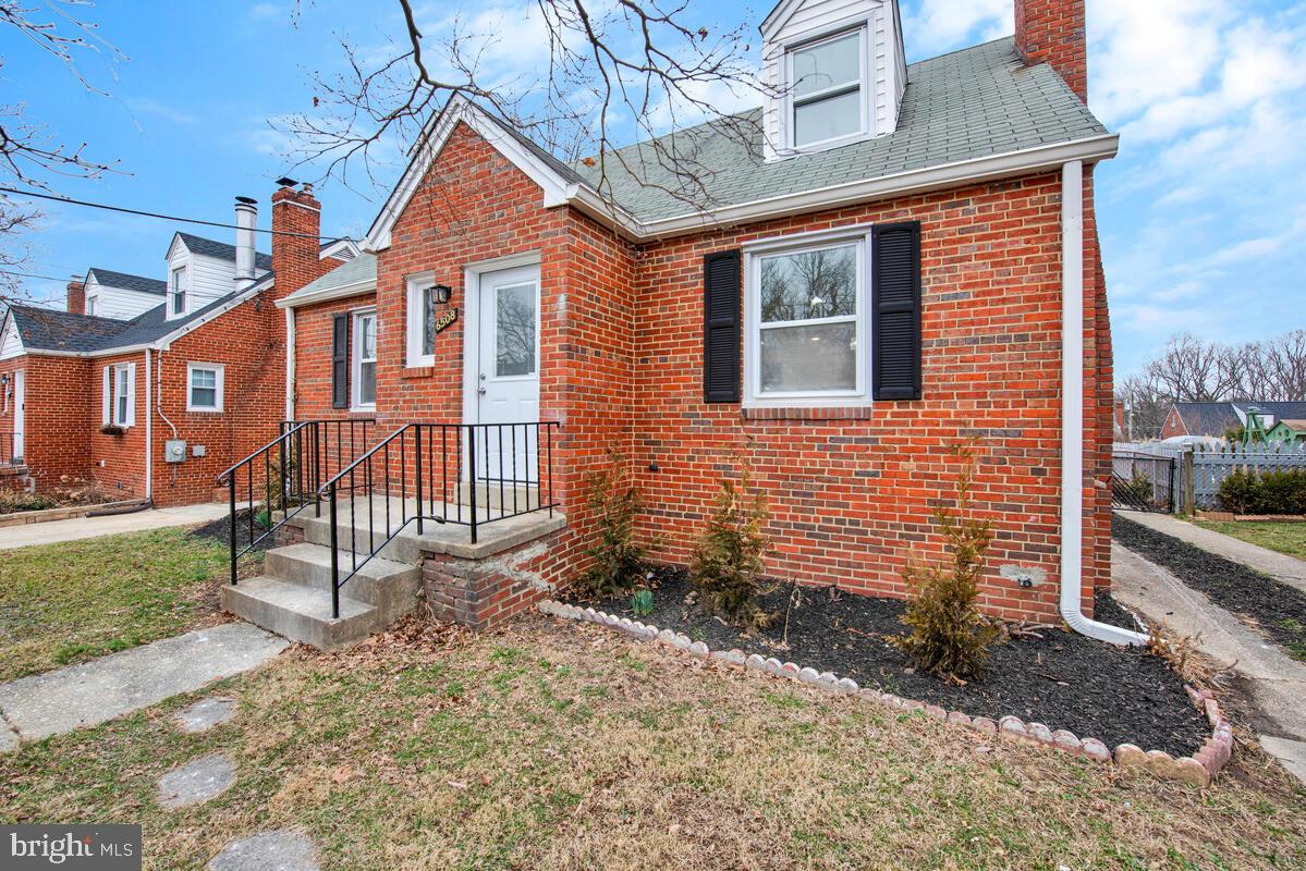 6508 Foster Street District Heights, MD 20747 - Photo 3 of 39 a front view of a house with a yard