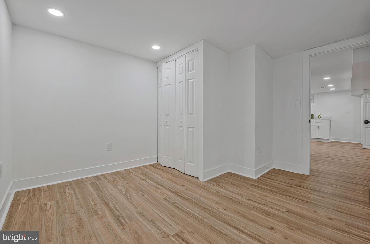 6508 Foster Street District Heights, MD 20747 - Photo 31 of 39 a view of an empty room with wooden floor
