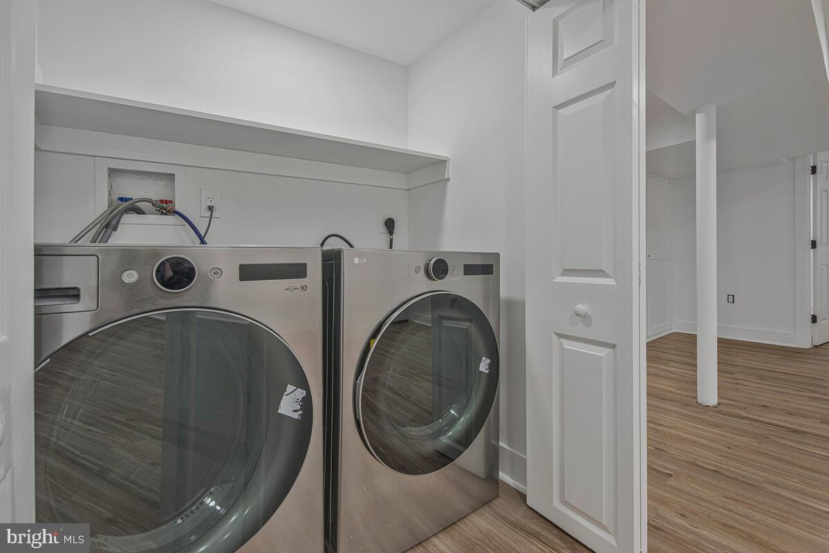 6508 Foster Street District Heights, MD 20747 - Photo 33 of 39 a utility room with dryer and washer
