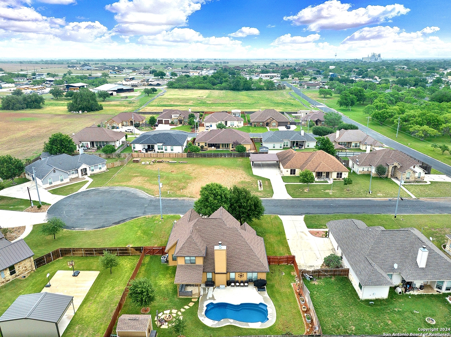 109 Park Way Poth, TX 78147 - Photo 30 of 35 an aerial view of a house with garden space and lake view