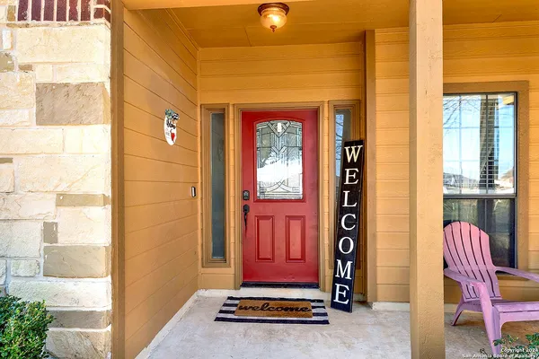 a front view of a house with glass doors