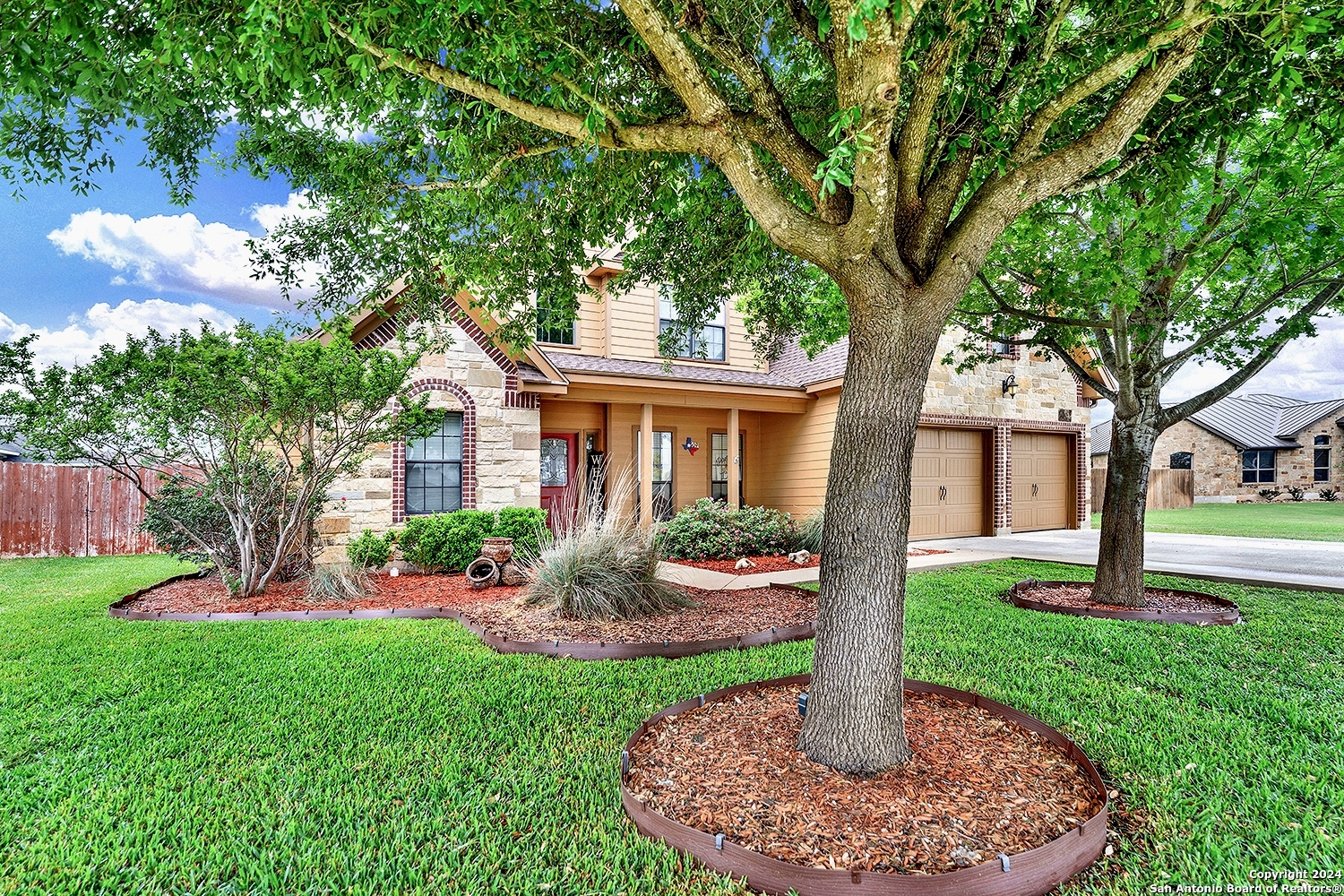 109 Park Way Poth, TX 78147 - Photo 33 of 35 a front view of a house with garden