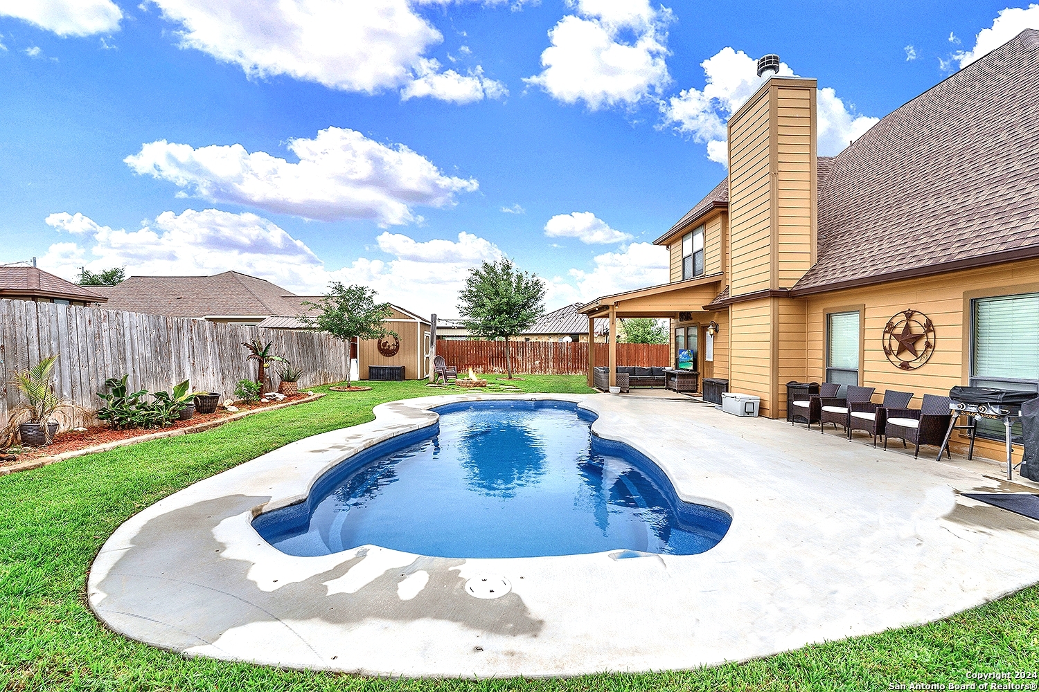 109 Park Way Poth, TX 78147 - Photo 34 of 35 a view of swimming pool with outdoor seating