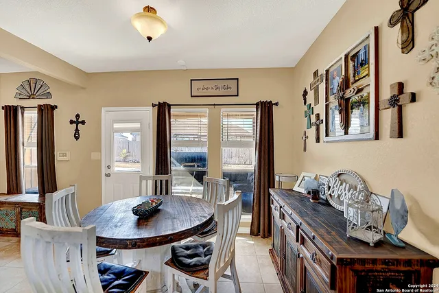 a living room with furniture and window