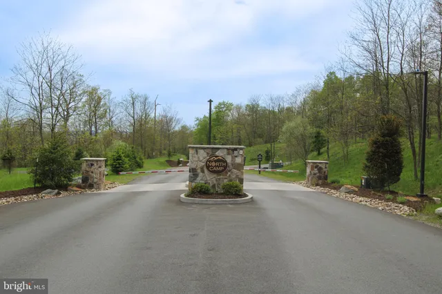 a view of a street with a building in the background