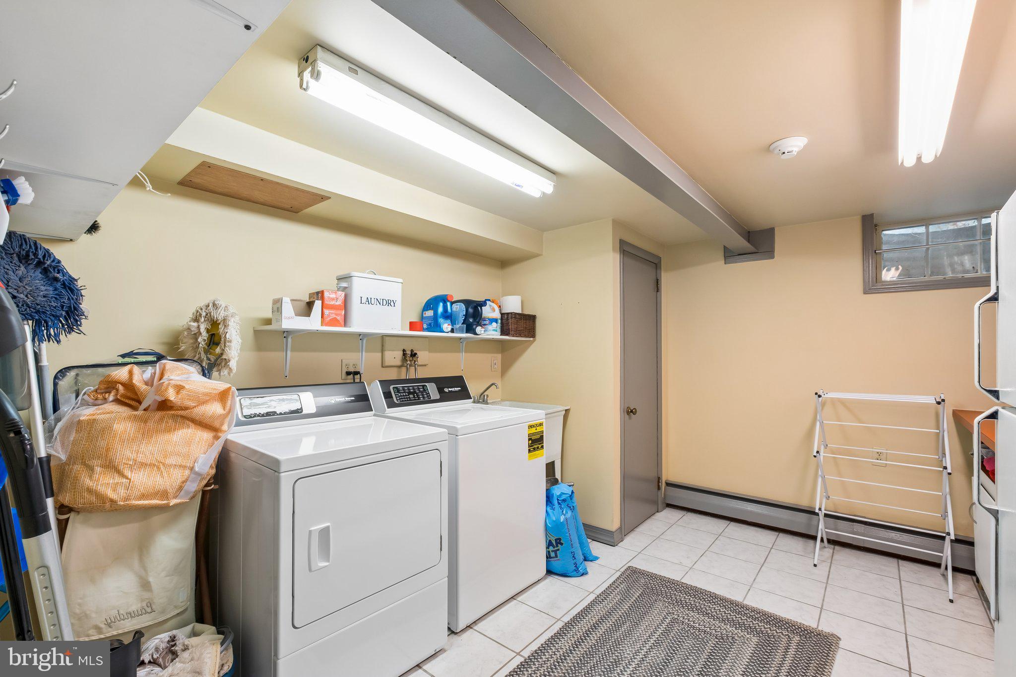 713 Alene Road Ambler, PA 19002 - Photo 33 of 40 a utility room with dryer and washer