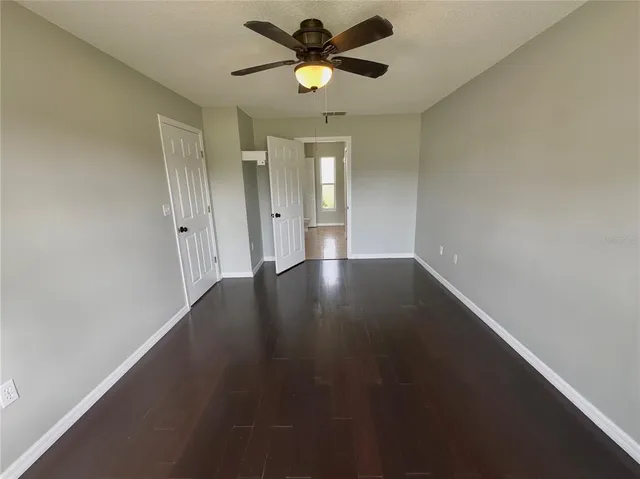 a backyard of a house with lots of green space