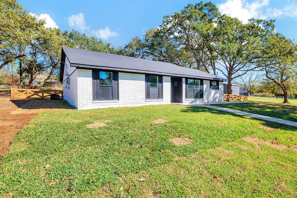 56 Crappie Road Pottsboro, TX 75076 - Photo 30 of 37 a view of a house with a yard and sitting area