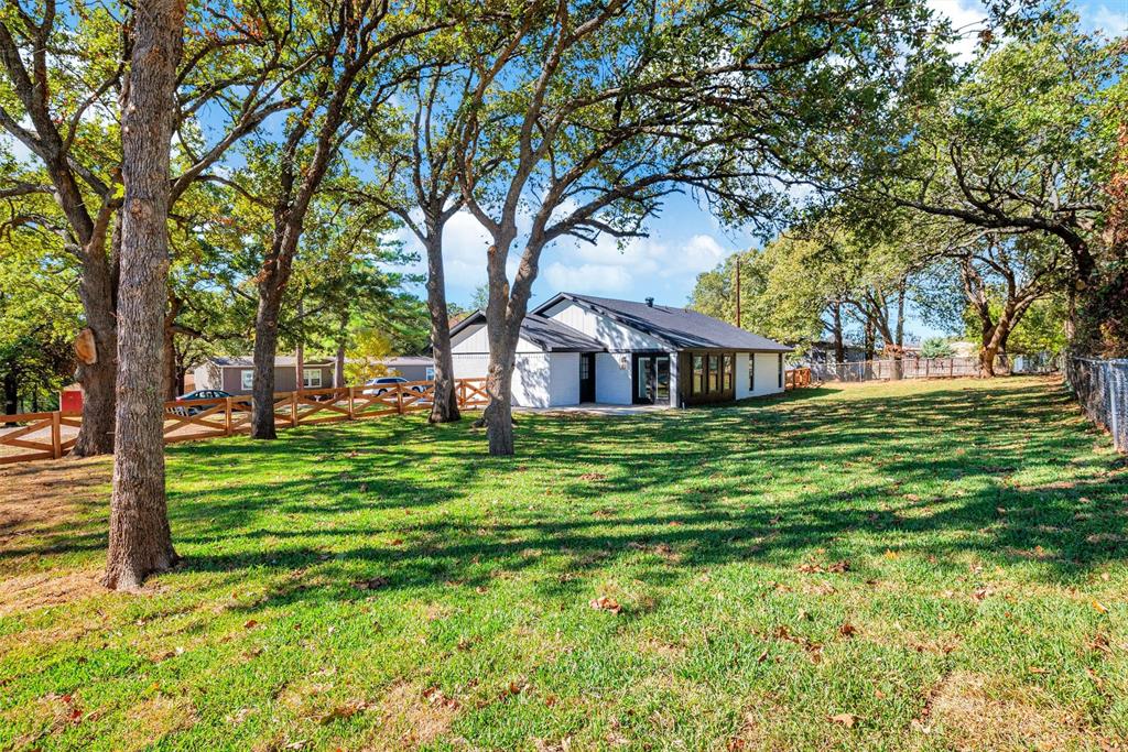 56 Crappie Road Pottsboro, TX 75076 - Photo 36 of 37 a front view of house with yard and green space
