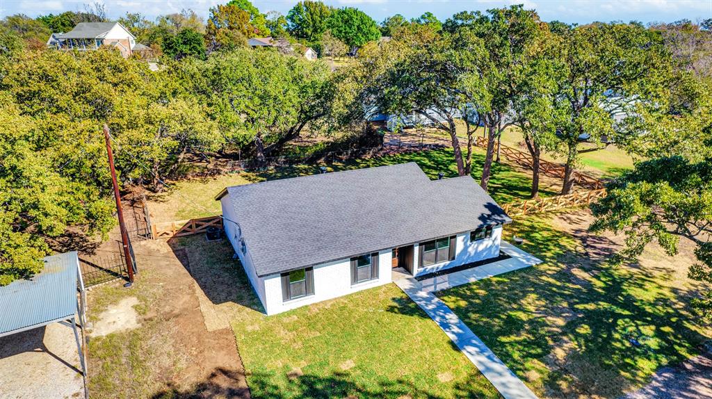 56 Crappie Road Pottsboro, TX 75076 - Photo 8 of 37 a aerial view of a house with swimming pool table and chairs