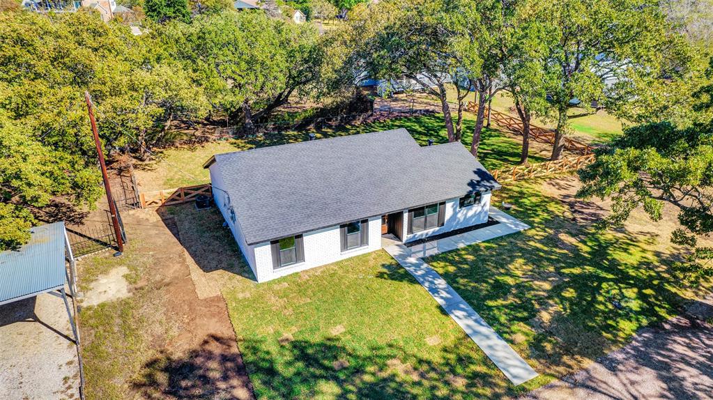 56 Crappie Road Pottsboro, TX 75076 - Photo 9 of 37 front view of a house with a yard