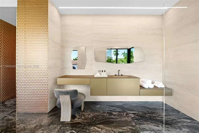 a picture of a bathroom with a sink and a mirror