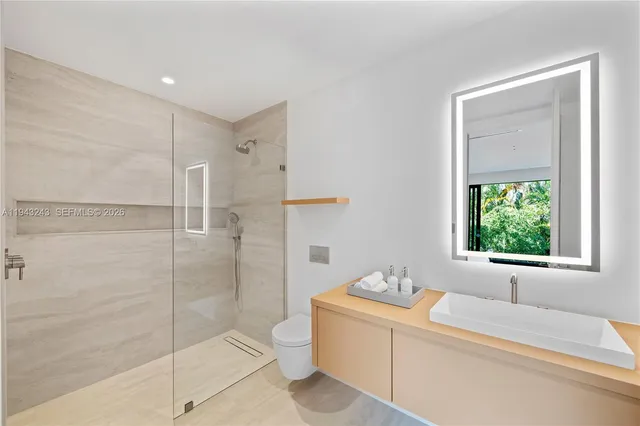 a view of an entryway with a door