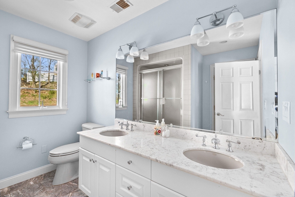 4 Baker Hill Drive Hingham, MA 02043 - Photo 26 of 40 a bathroom with a granite countertop double vanity sink mirror and toilet