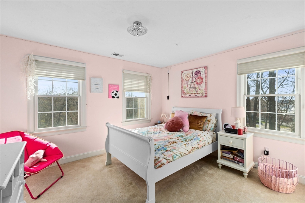 4 Baker Hill Drive Hingham, MA 02043 - Photo 27 of 40 a bedroom with a bed and a window