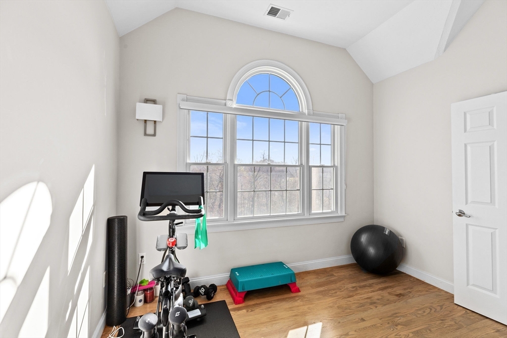 4 Baker Hill Drive Hingham, MA 02043 - Photo 29 of 40 a living room with furniture and a flat screen tv