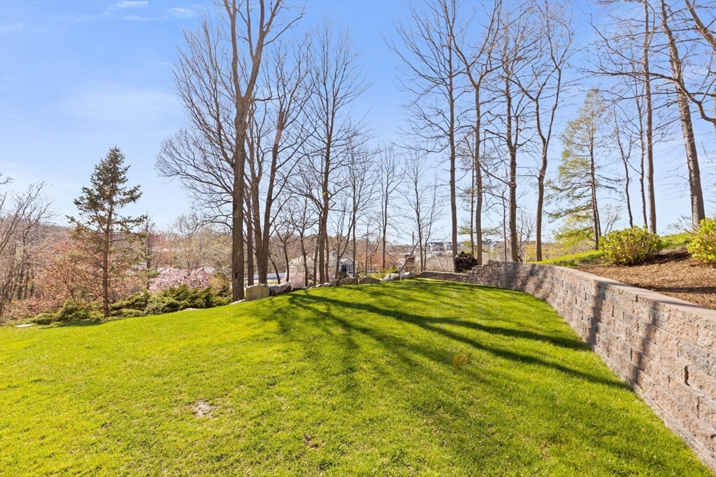 4 Baker Hill Drive Hingham, MA 02043 - Photo 38 of 40 a swimming pool with an outdoor space and seating area