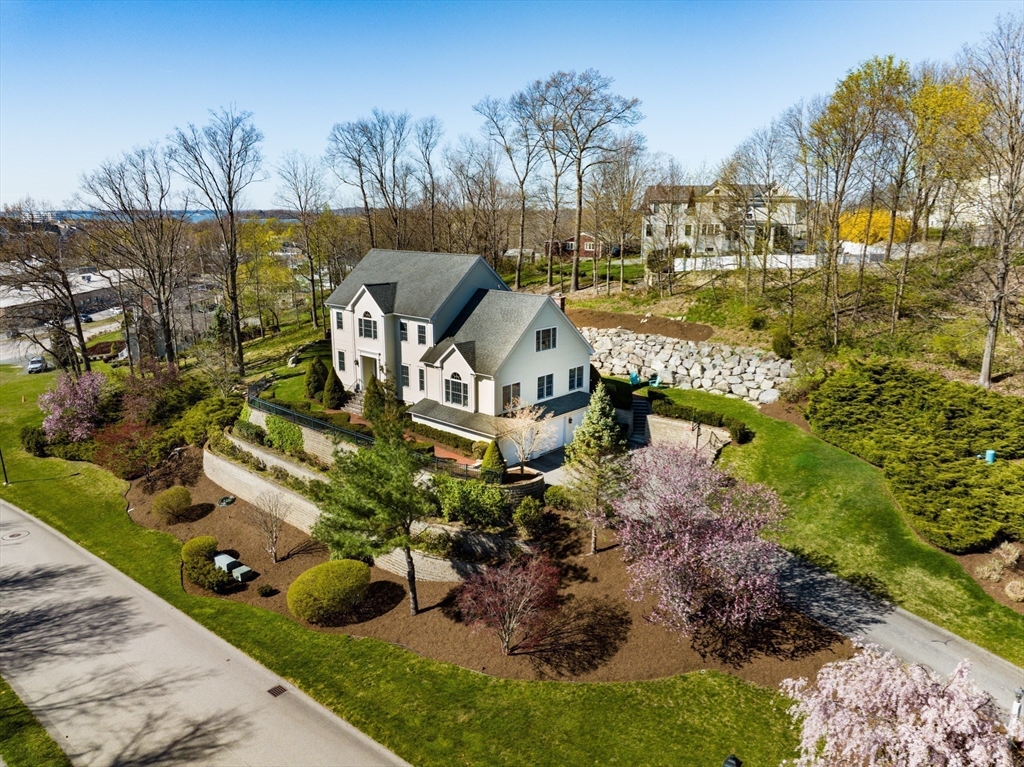 4 Baker Hill Drive Hingham, MA 02043 - Photo 39 of 40 a view of a house with a yard and sitting area