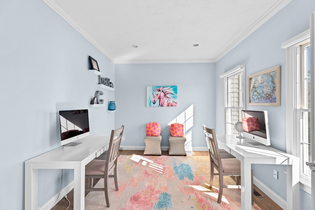 4 Baker Hill Drive Hingham, MA 02043 - Photo 4 of 40 a living room with fireplace furniture and a flat screen tv