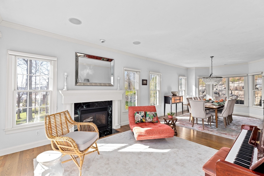 4 Baker Hill Drive Hingham, MA 02043 - Photo 5 of 40 a living room with furniture fireplace and window