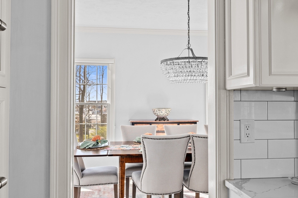 4 Baker Hill Drive Hingham, MA 02043 - Photo 8 of 40 a room with a window and chairs