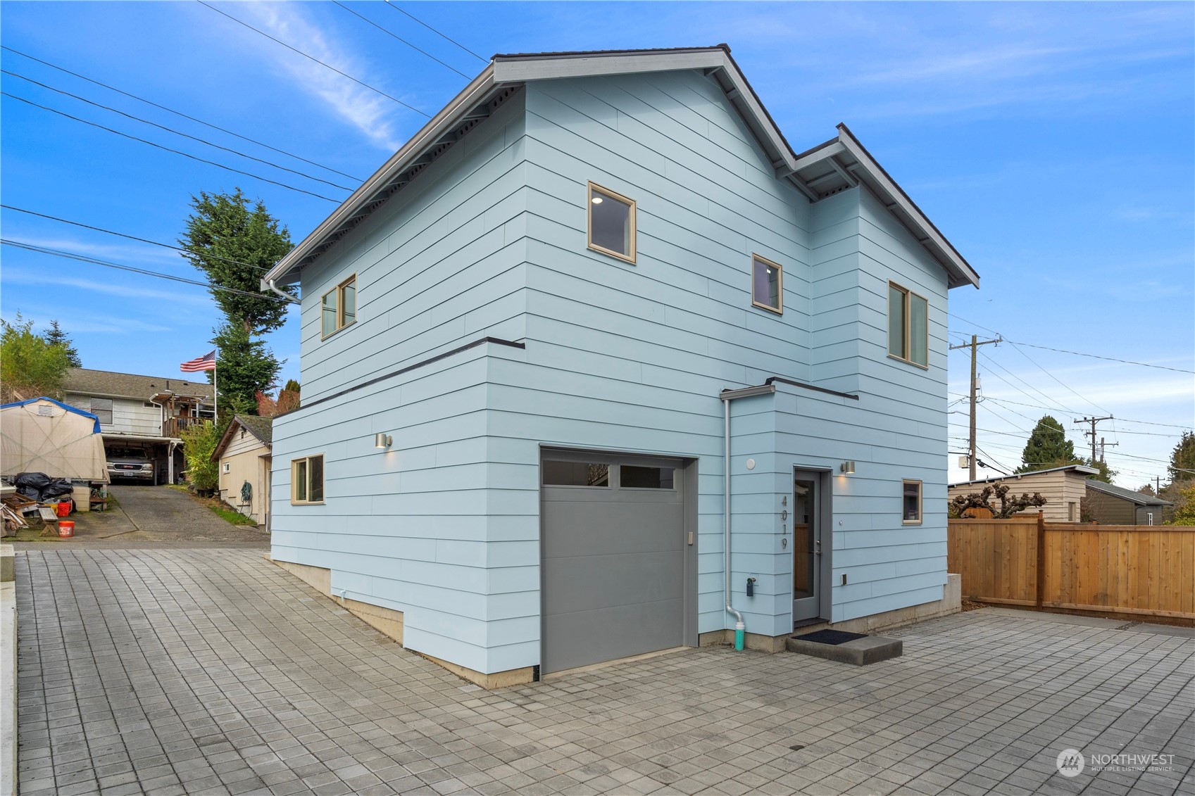 4019 51st Avenue Southwest Seattle, WA 98116 - Photo 2 of 33 a view of a house with a yard