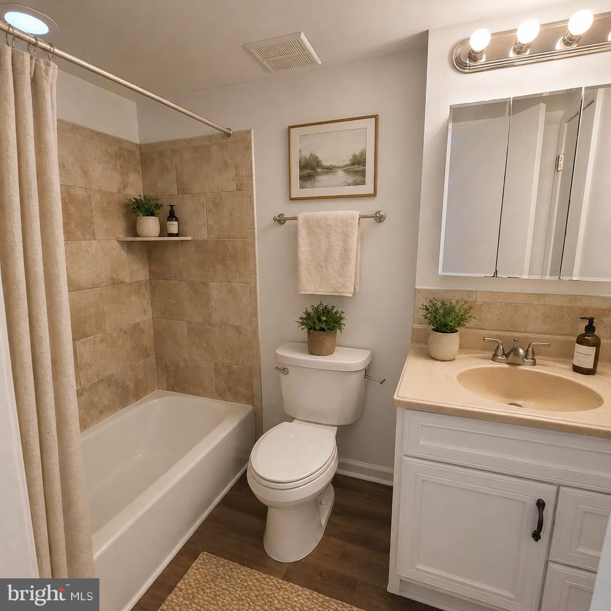 1833 Addison Road South District Heights, MD 20747 - Photo 4 of 14 a bath room with a toilet a sink and a bath tub