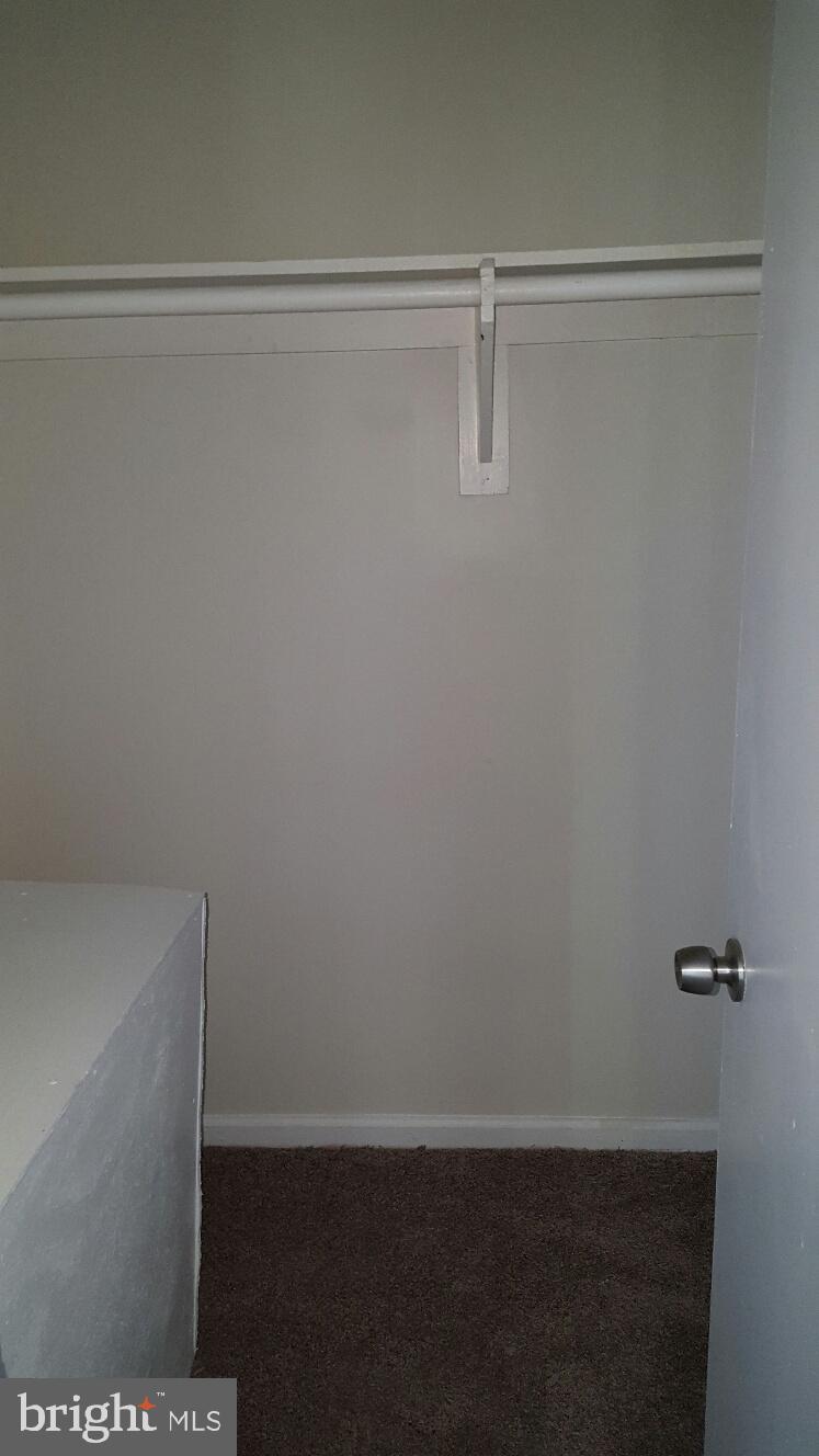 1833 Addison Road South District Heights, MD 20747 - Photo 9 of 14 a view of small space with racks on the wall