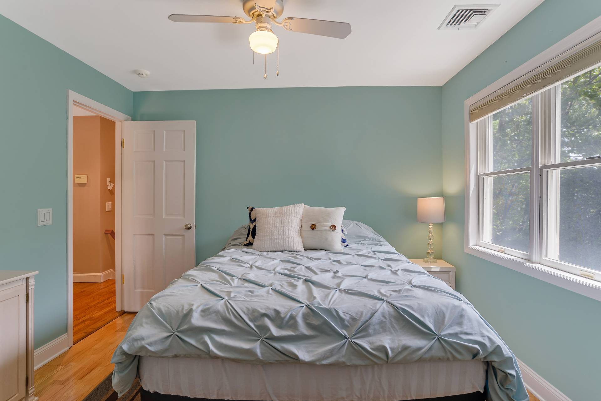 49 Bridle Path Westhampton Beach, NY 11978 - Photo 19 of 37 a bedroom with a bed and window