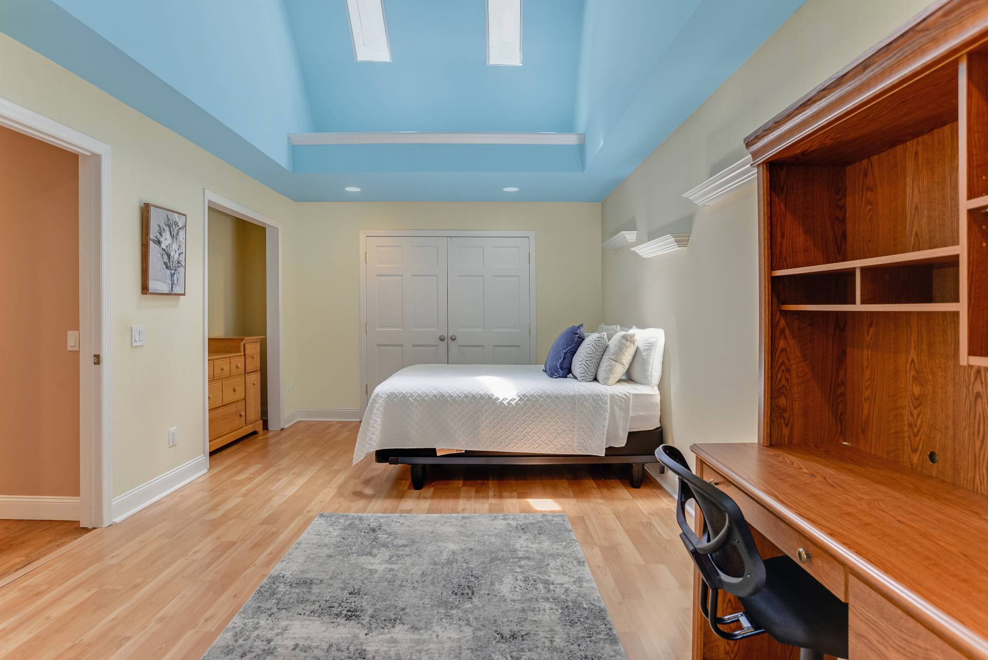 49 Bridle Path Westhampton Beach, NY 11978 - Photo 24 of 37 a bedroom with a bed and a desk