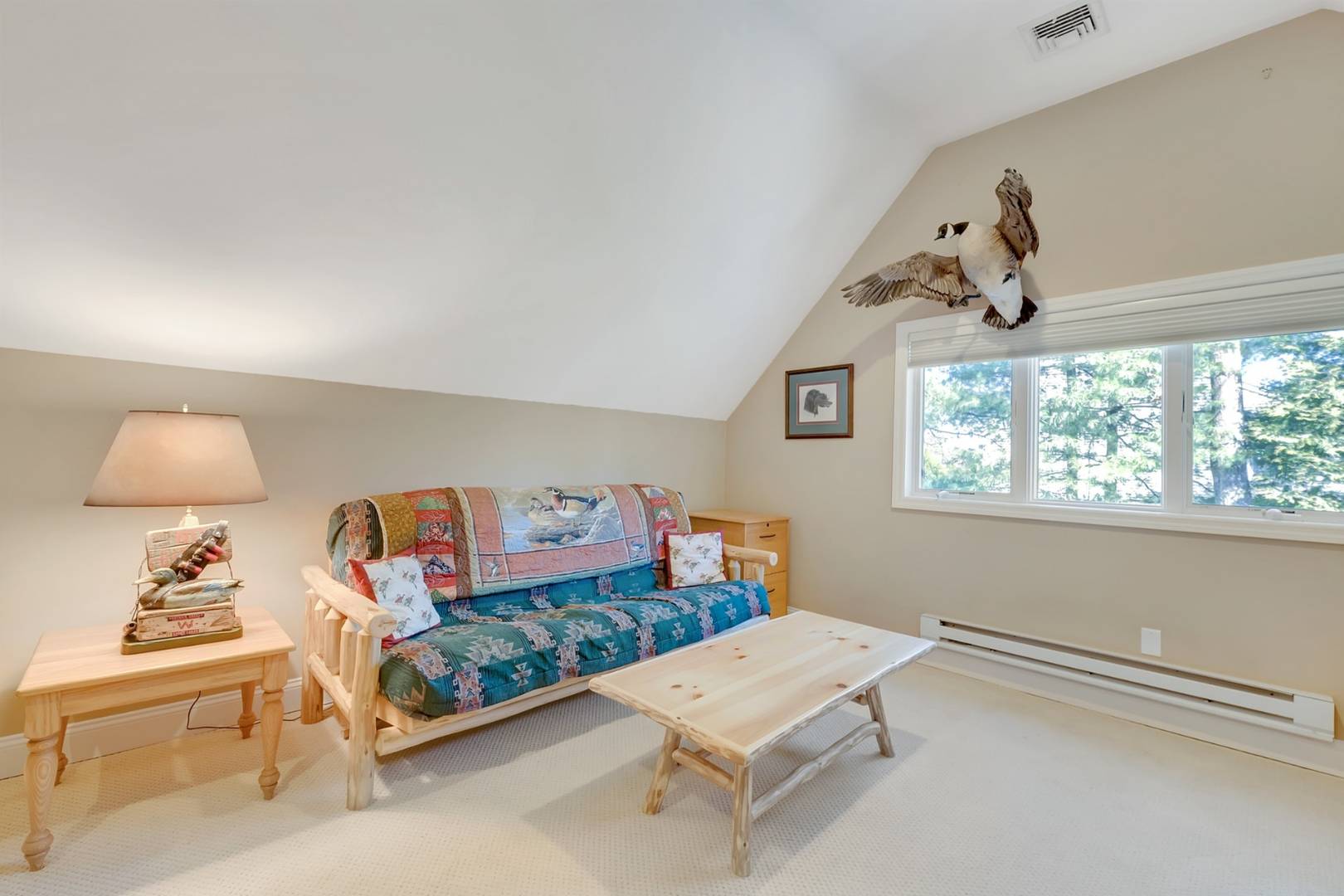 49 Bridle Path Westhampton Beach, NY 11978 - Photo 25 of 37 a bedroom with furniture and a window