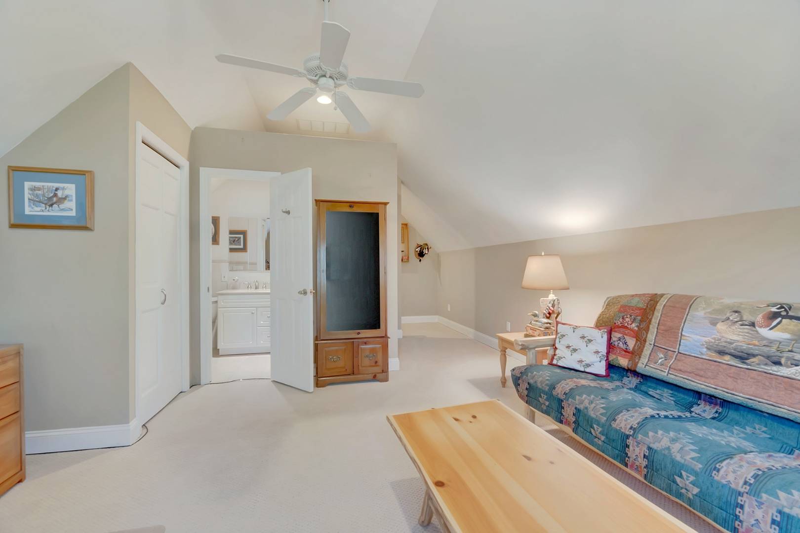 49 Bridle Path Westhampton Beach, NY 11978 - Photo 26 of 37 a living room with furniture and a table