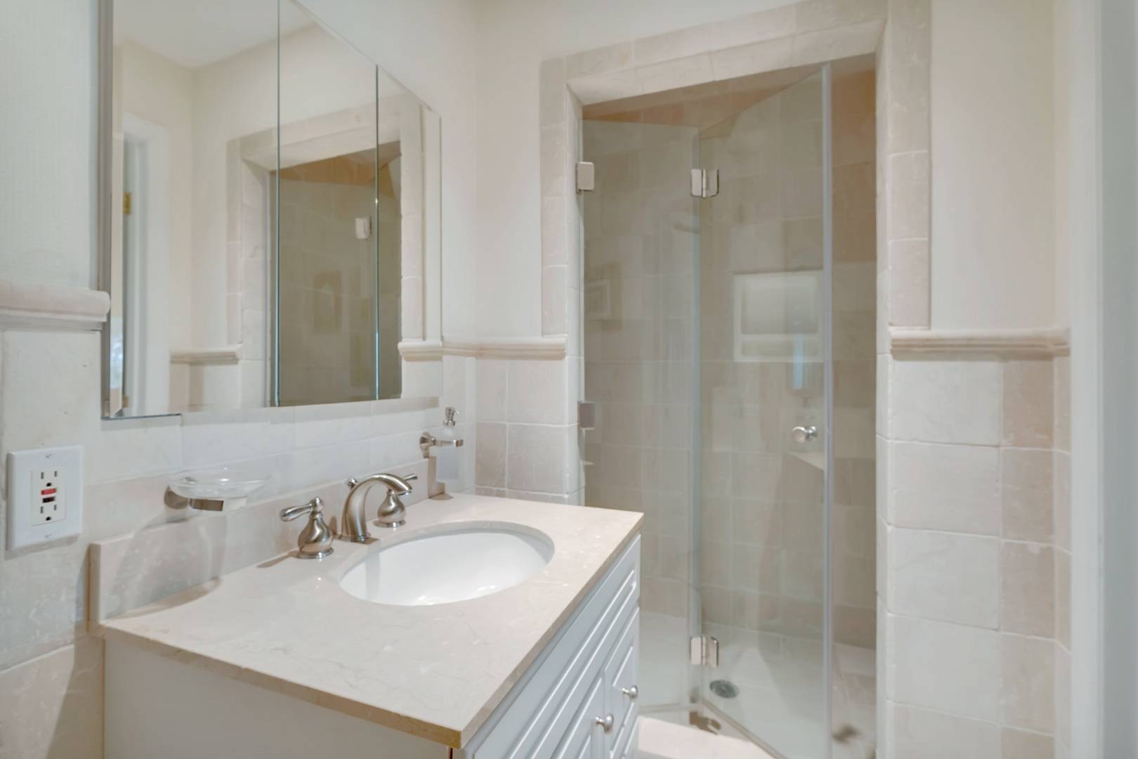 49 Bridle Path Westhampton Beach, NY 11978 - Photo 27 of 37 a bathroom with a sink a toilet and shower