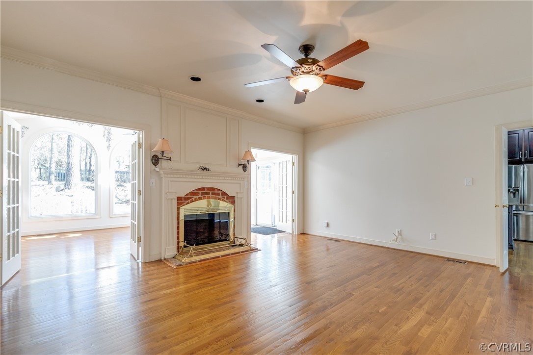 1931 Thornleigh Road Midlothian, VA 23113 - Photo 17 of 46 a view of an empty room with wooden floor and a window