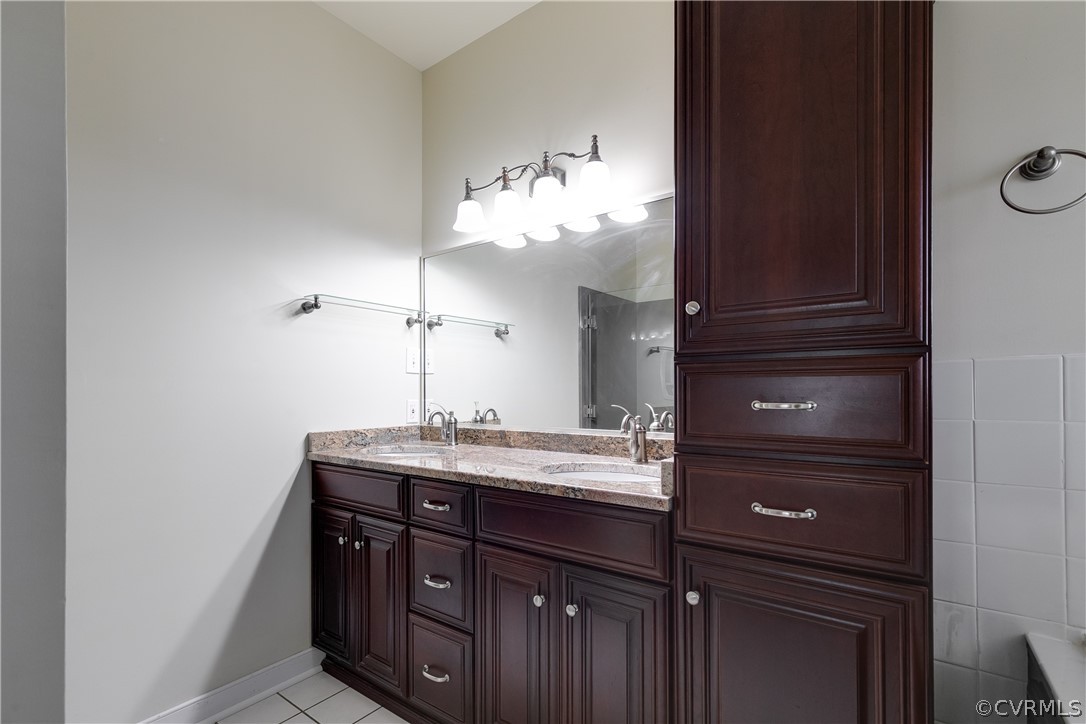 1931 Thornleigh Road Midlothian, VA 23113 - Photo 25 of 46 a bathroom with a sink and a mirror