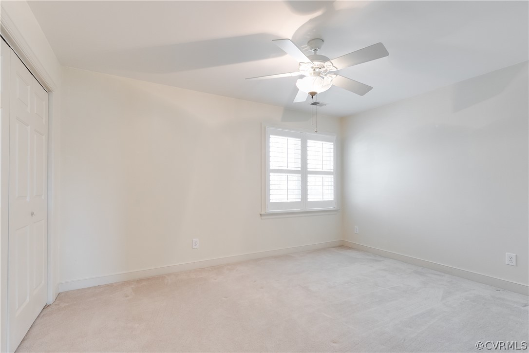 1931 Thornleigh Road Midlothian, VA 23113 - Photo 30 of 46 an empty room with windows and fan