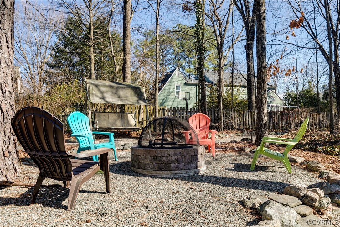 1931 Thornleigh Road Midlothian, VA 23113 - Photo 38 of 46 a backyard of a house with barbeque oven table and chairs