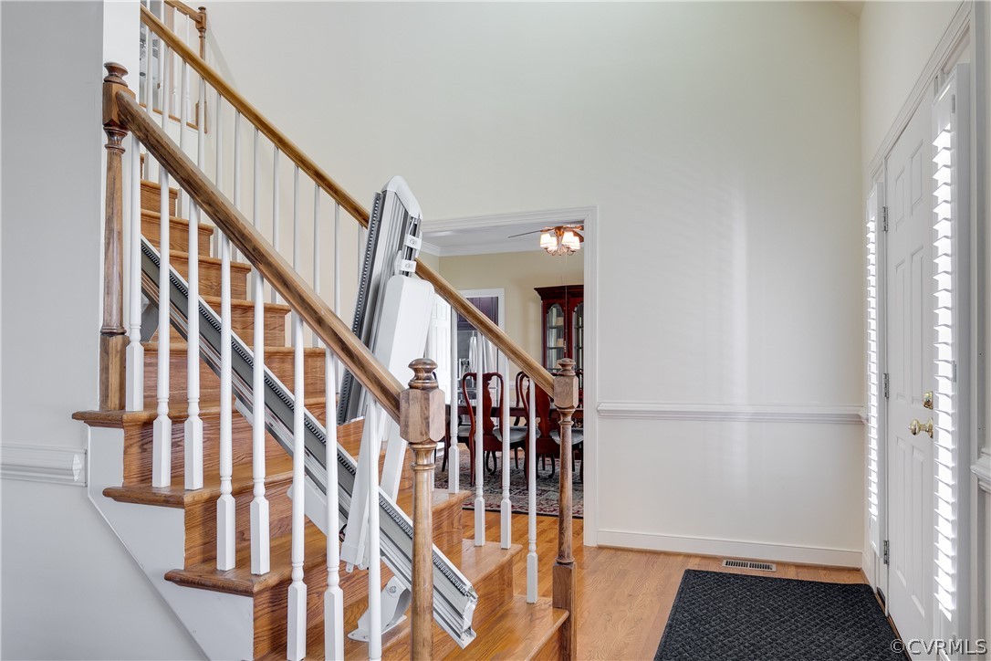 1931 Thornleigh Road Midlothian, VA 23113 - Photo 8 of 46 a view of staircase with wooden floor and white walls