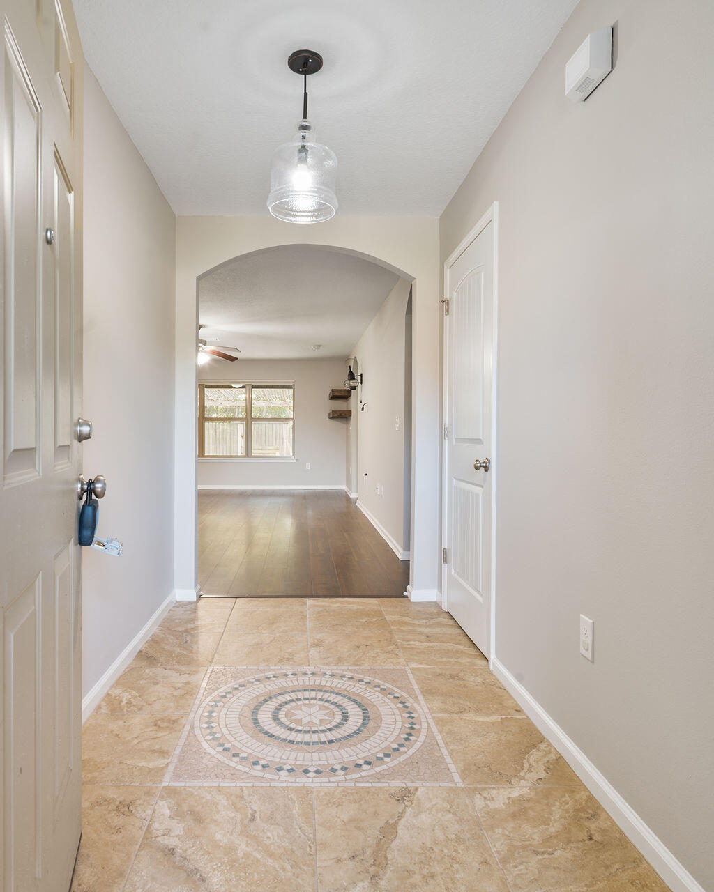 4889 Spears Street Pace, FL 32571 - Photo 3 of 25 a view of a livingroom with wooden floor