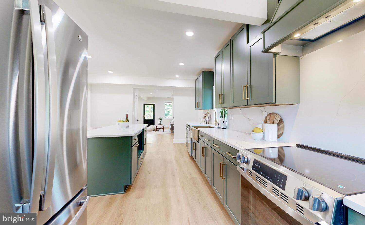 4414 Mt Carmel Road Hampstead, MD 21074 - Photo 11 of 40 a kitchen with counter top space and stainless steel appliances