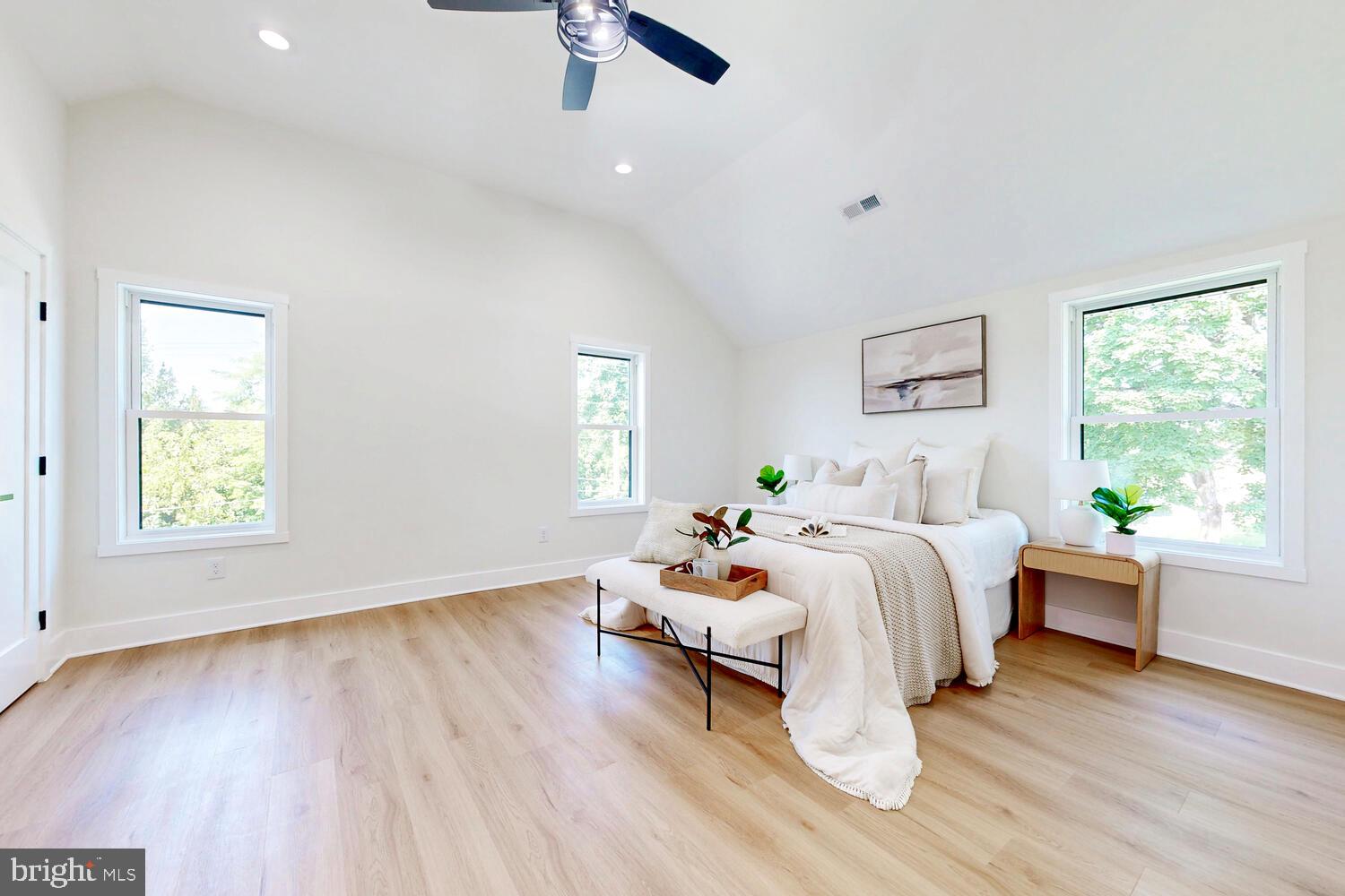 4414 Mt Carmel Road Hampstead, MD 21074 - Photo 17 of 40 a bedroom with a bed and wooden floor